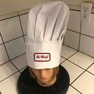 White Chef Hat- 13” tall and about 25” around- be the chef you want to be.